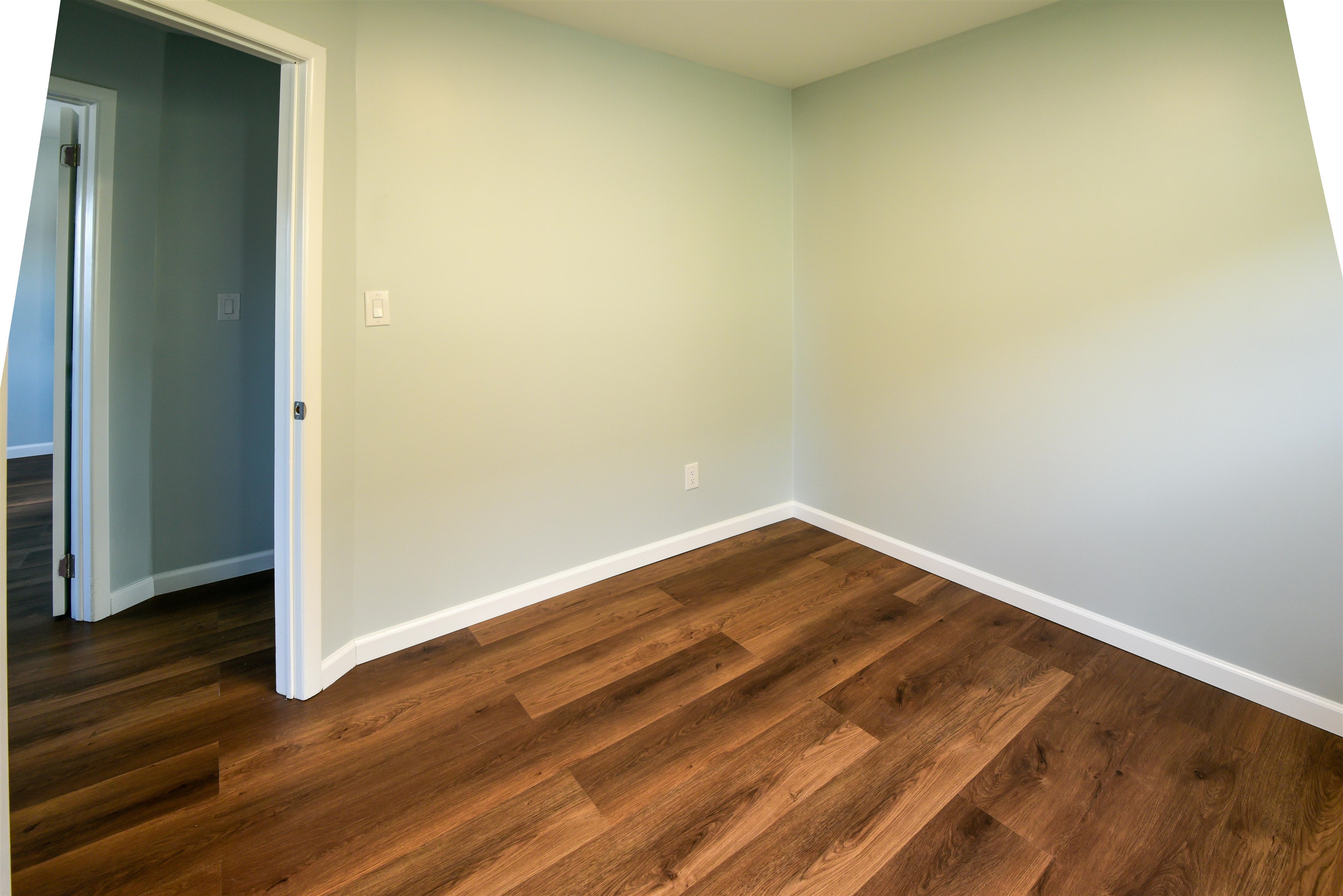 45 East 51st Street Bayonne, NJ 07002 - Photo 15 of 26 an empty room with wooden floor