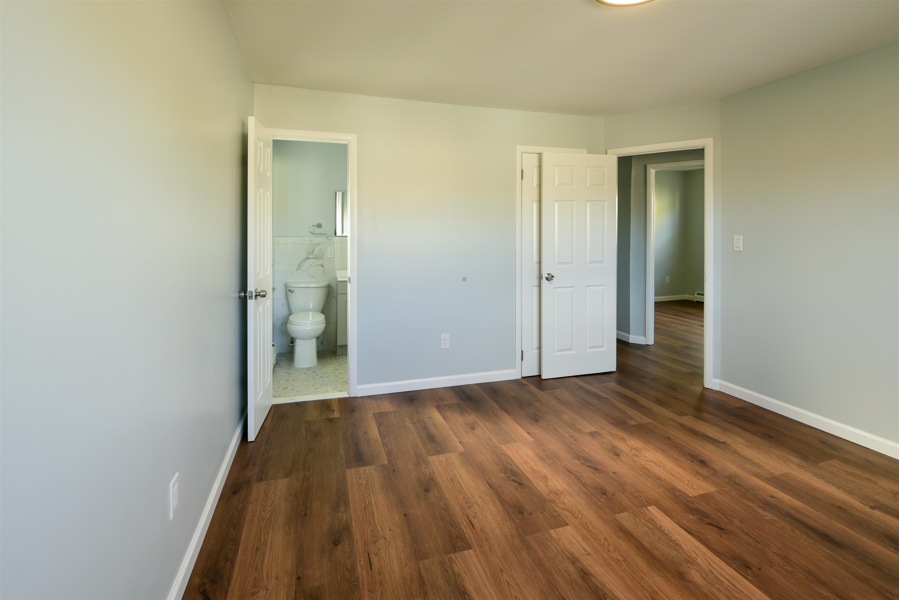 45 East 51st Street Bayonne, NJ 07002 - Photo 18 of 26 a view of hallway with wooden floor