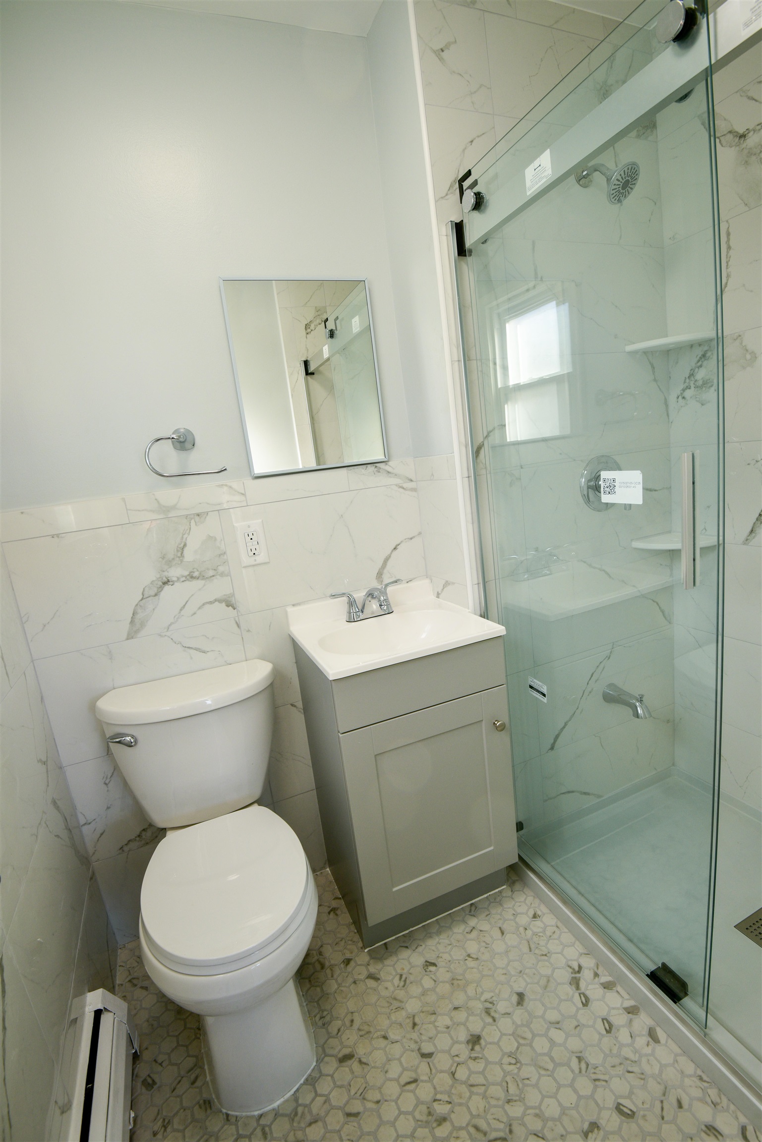 45 East 51st Street Bayonne, NJ 07002 - Photo 26 of 26 a bathroom with a sink toilet and shower