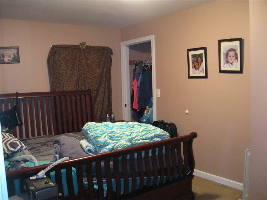4060 Old Mercer Road New Castle, PA 16105 - Photo 15 of 20 Main floor bedroom with half bath