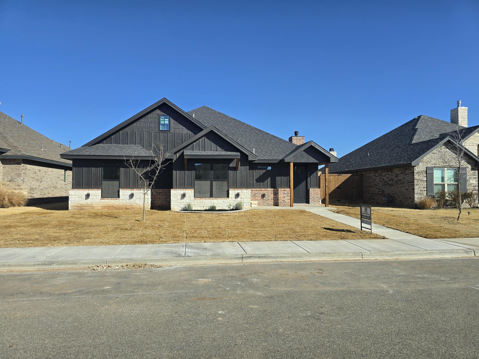 7814 53rd Street Lubbock, TX 79407 - Photo 24 of 24 a house with trees in the background