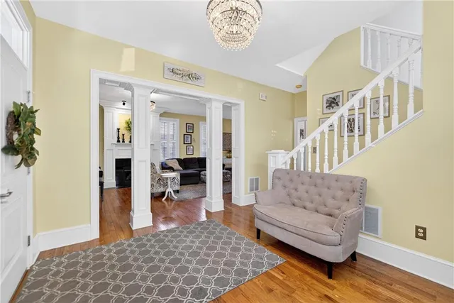 a living room with furniture and a table