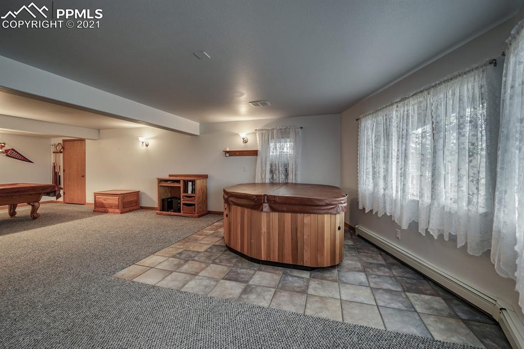 13770 Woodlake Road Elbert, CO 80106 - Photo 15 of 43 a room with furniture and window