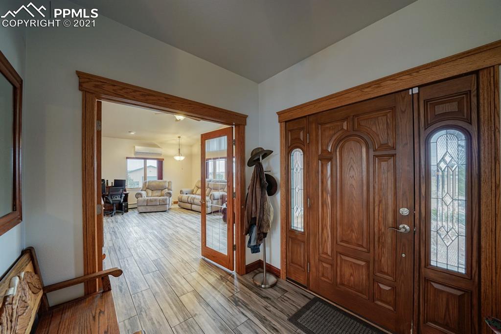 13770 Woodlake Road Elbert, CO 80106 - Photo 28 of 43 a view of front door with livingroom