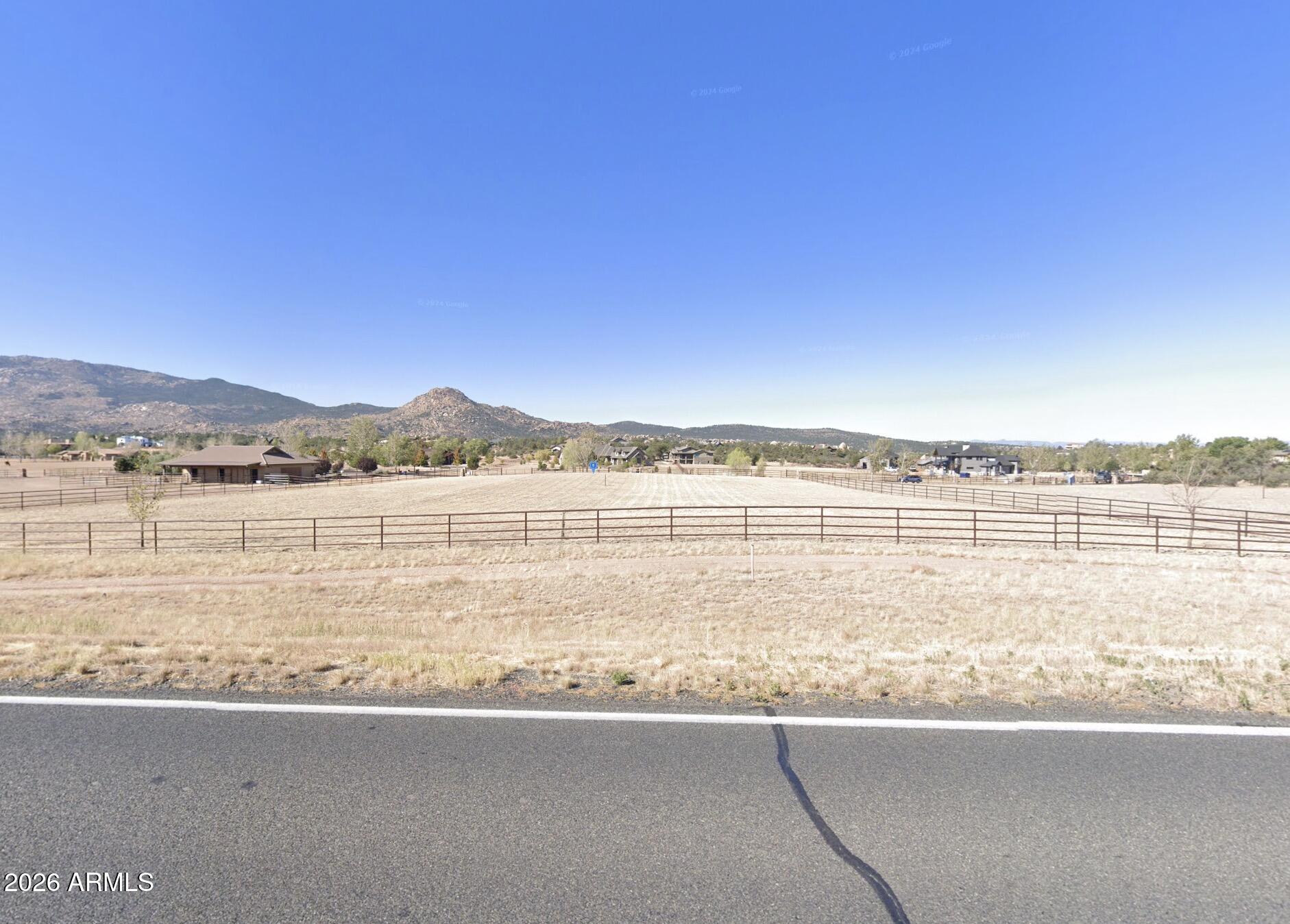 9919 North American Ranch Road, Unit 7 Prescott, AZ 86305 - Photo 2 of 5 a view of an ocean with a city view