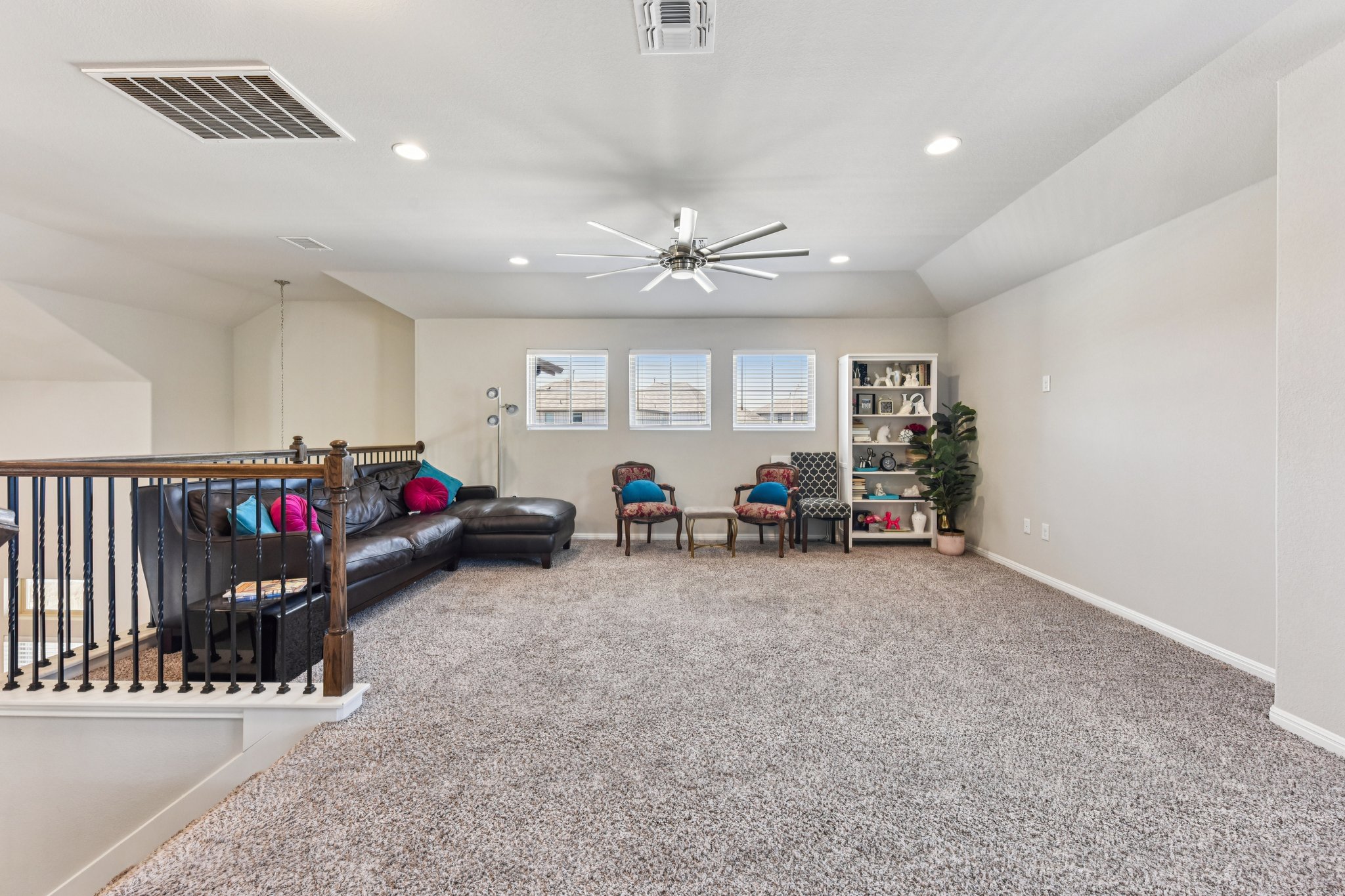 908 Goldilocks Lane Manchaca, TX 78652 - Photo 19 of 34 From this angle, you can really see the scale of the room, with plenty of flexibility to arrange it in a way that fits your needs.