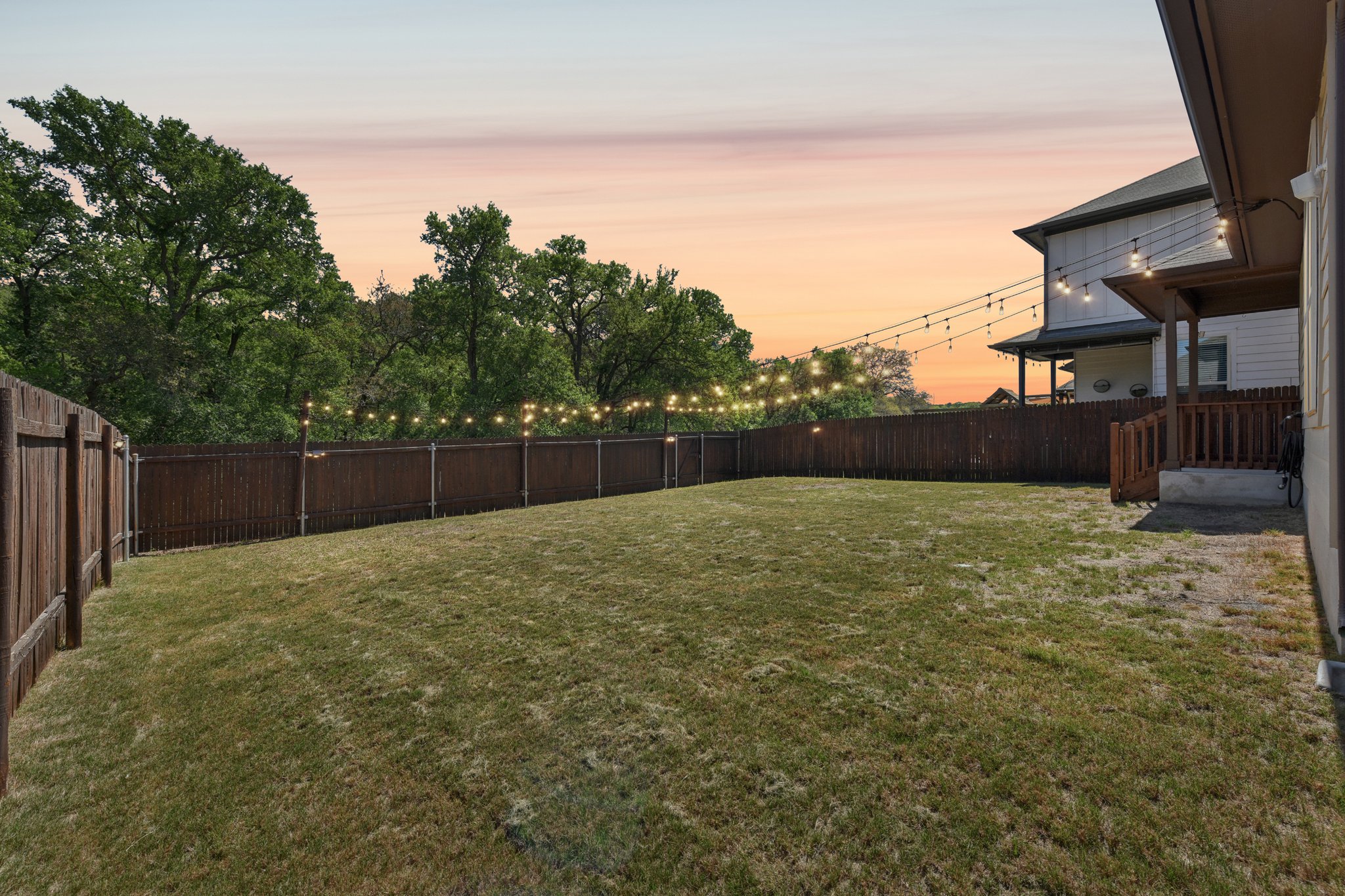 908 Goldilocks Lane Manchaca, TX 78652 - Photo 25 of 34 A gate offers direct access to step out and enjoy the natural space beyond.