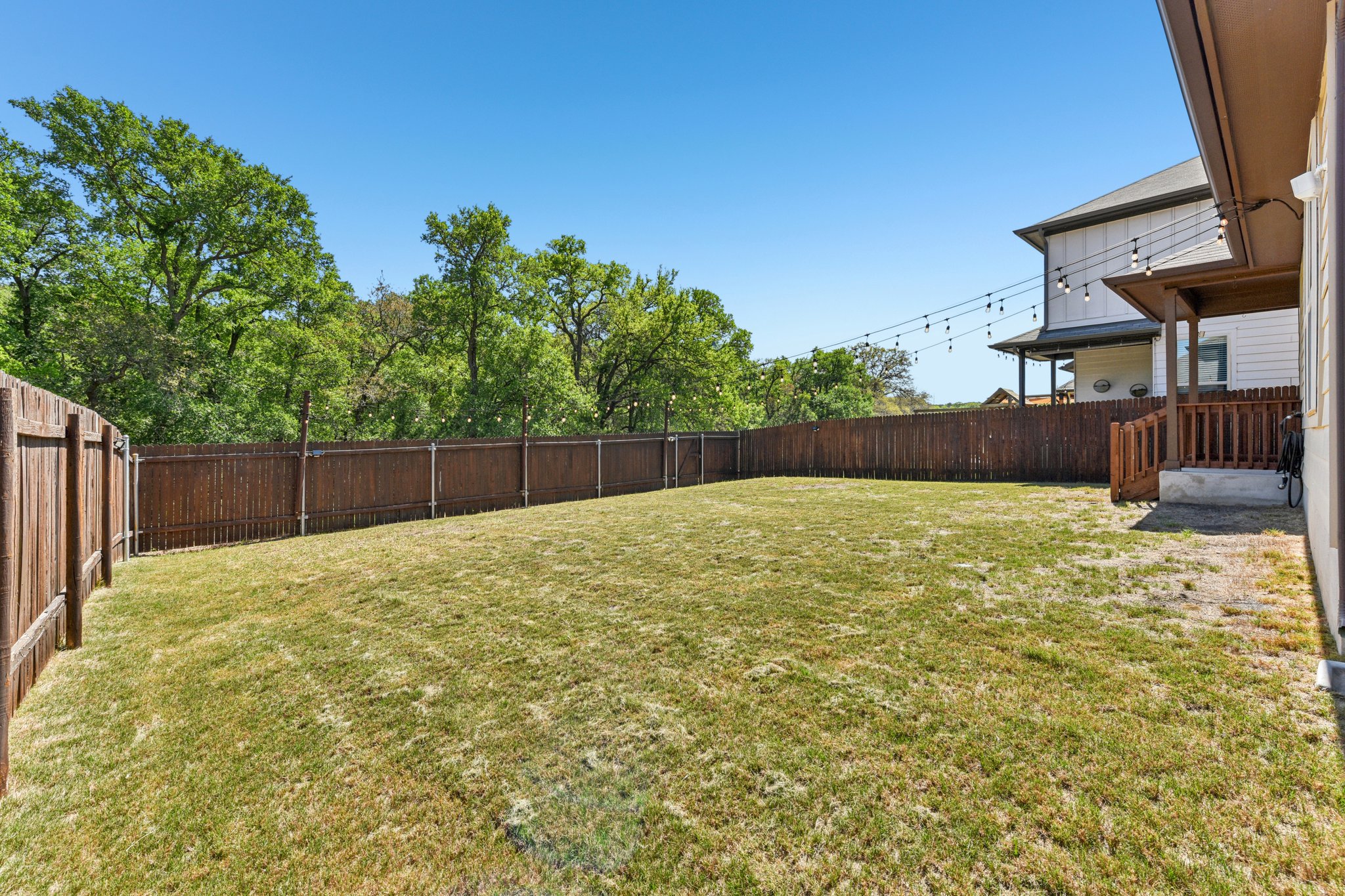 908 Goldilocks Lane Manchaca, TX 78652 - Photo 26 of 34 Spacious backyard that backs to a greenbelt.