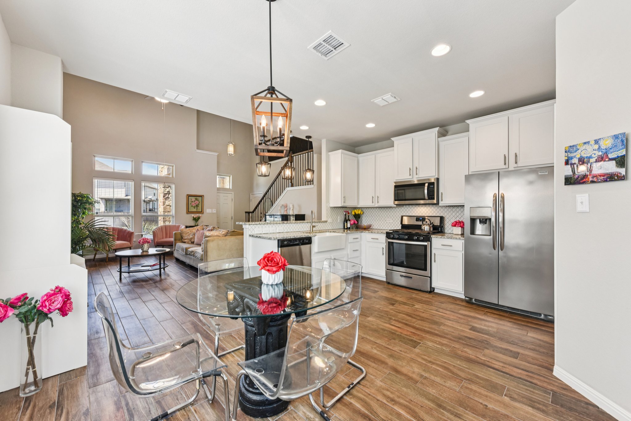 908 Goldilocks Lane Manchaca, TX 78652 - Photo 8 of 34 Set just off the kitchen, the dining area keeps everything connected, with plenty of room to gather while still feeling open to the main living space.