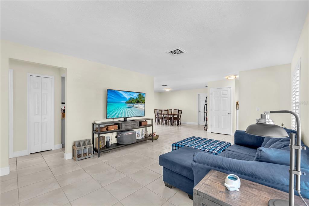 911 Silver Palm Way Apollo Beach, FL 33572 - Photo 11 of 35 a living room with furniture and a couch