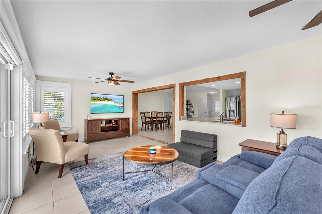 911 Silver Palm Way Apollo Beach, FL 33572 - Photo 24 of 35 a living room with furniture and a fireplace