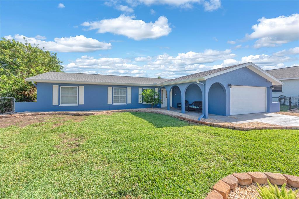 911 Silver Palm Way Apollo Beach, FL 33572 - Photo 3 of 35 a view of a house with a backyard