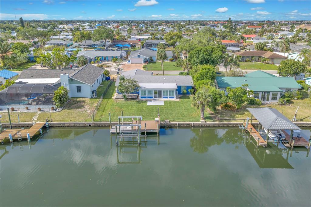 911 Silver Palm Way Apollo Beach, FL 33572 - Photo 35 of 35 an aerial view of residential houses with outdoor space and swimming pool