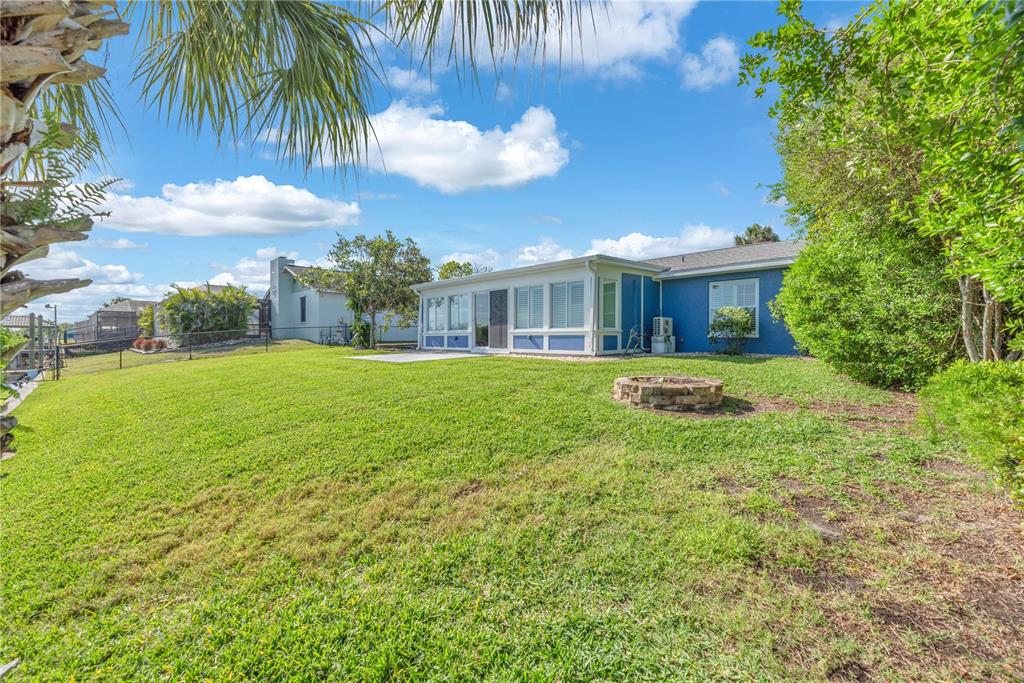 911 Silver Palm Way Apollo Beach, FL 33572 - Photo 5 of 35 a view of a house with a backyard