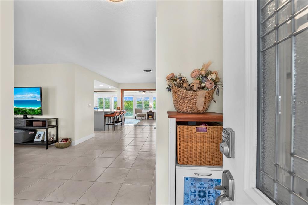 911 Silver Palm Way Apollo Beach, FL 33572 - Photo 8 of 35 a living room with furniture and large window