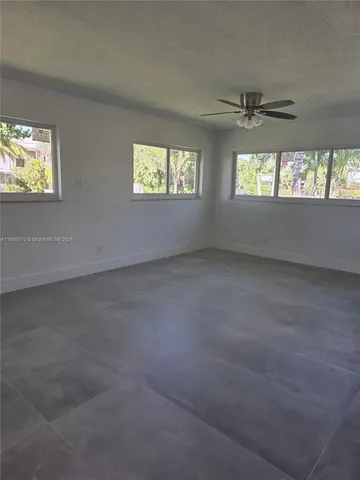 a bathroom with a sink and vanity