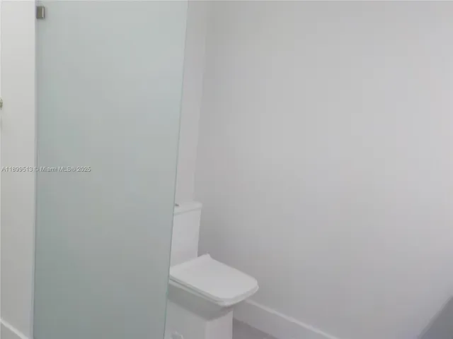 a kitchen with a sink and washing machine