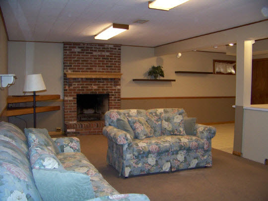 3518 North View Road Rockford, IL 61114 - Photo 10 of 10 a living room with furniture and a fireplace