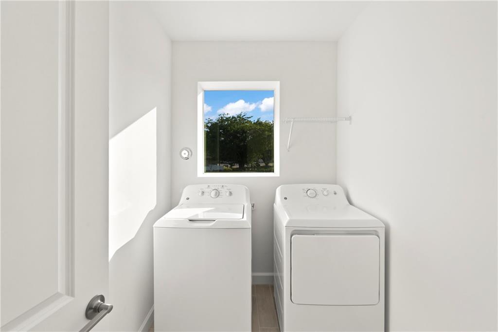 23078 Hillshire Road Boca Raton, FL 33433 - Photo 7 of 20 a utility room with dryer and washer