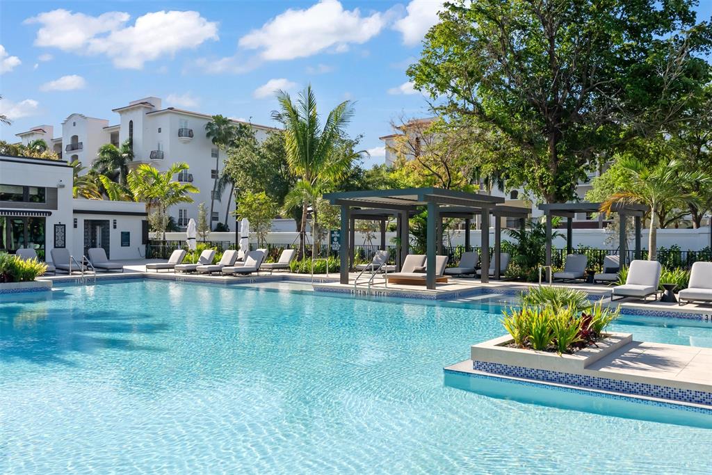 23078 Hillshire Road Boca Raton, FL 33433 - Photo 10 of 20 a front view of a house with swimming pool having outdoor seating