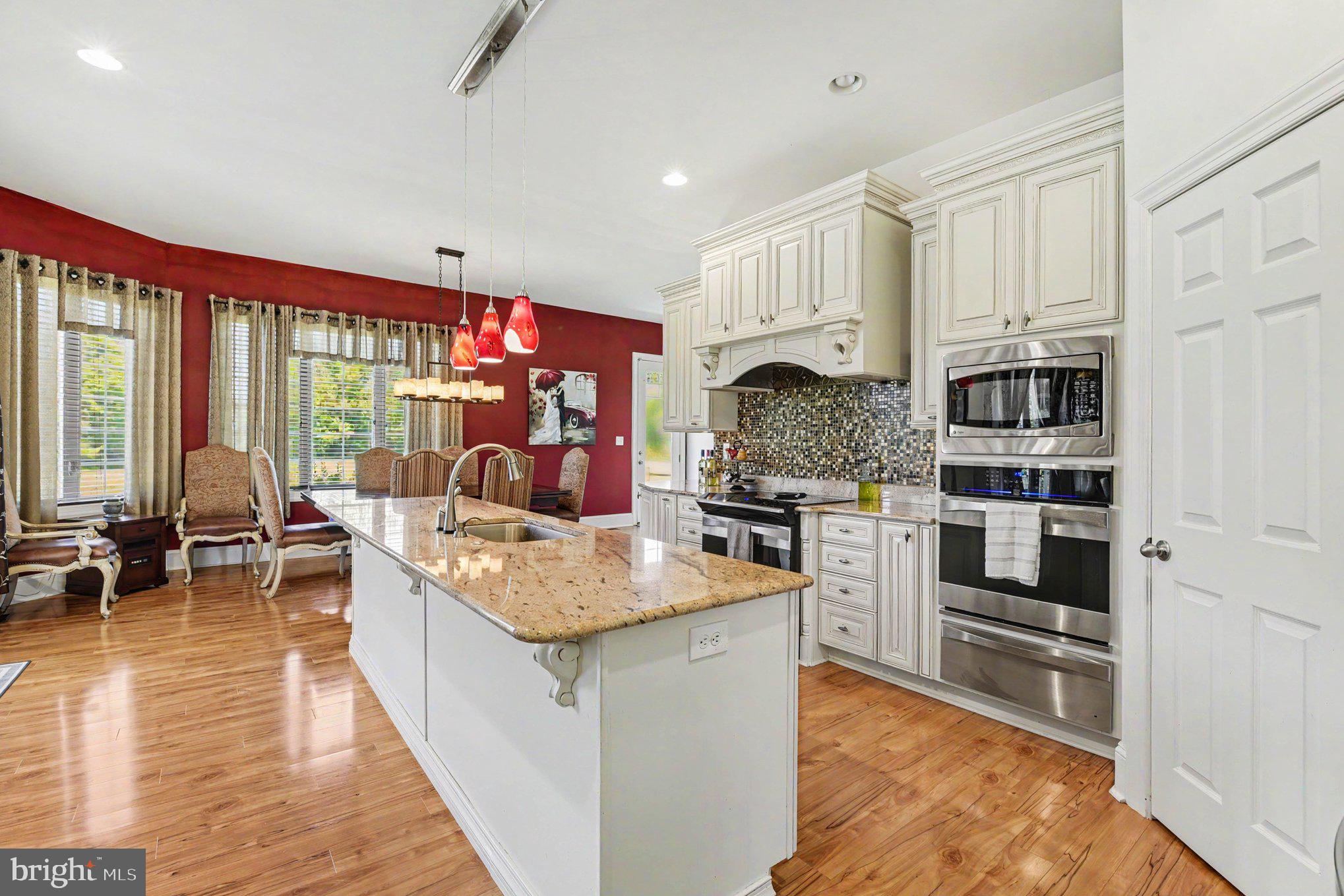 627 Dr Miller Road North East, MD 21901 - Photo 16 of 77 Sleek Granite Countertops & Glass Tile Backsplash