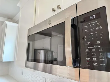 a view of a hallway with windows