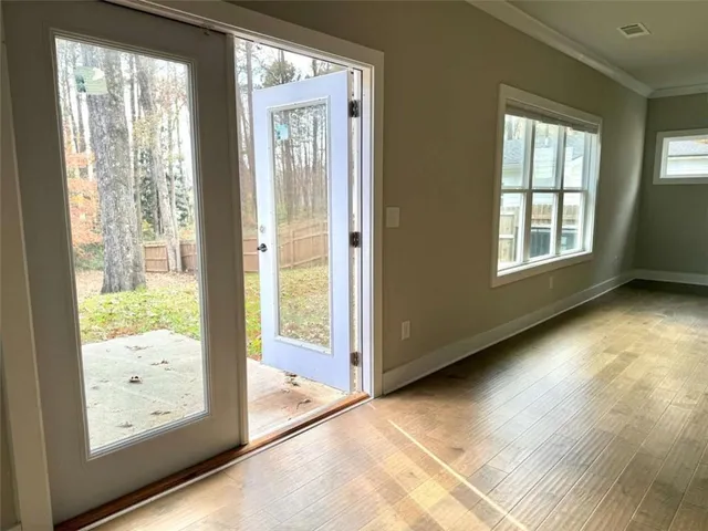 a view of an empty room and window