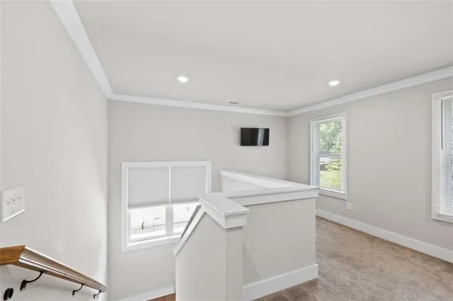 a spacious bathroom with a double vanity sink mirror double and shower
