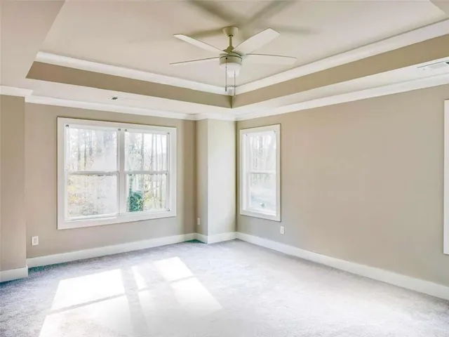 a bathroom with a tub and shower