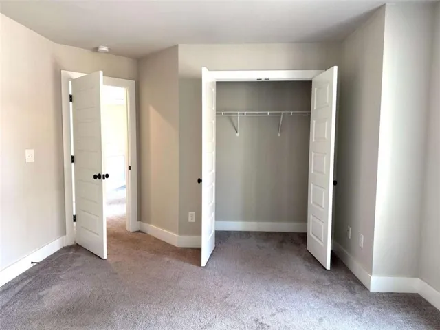 a view of a park with furniture