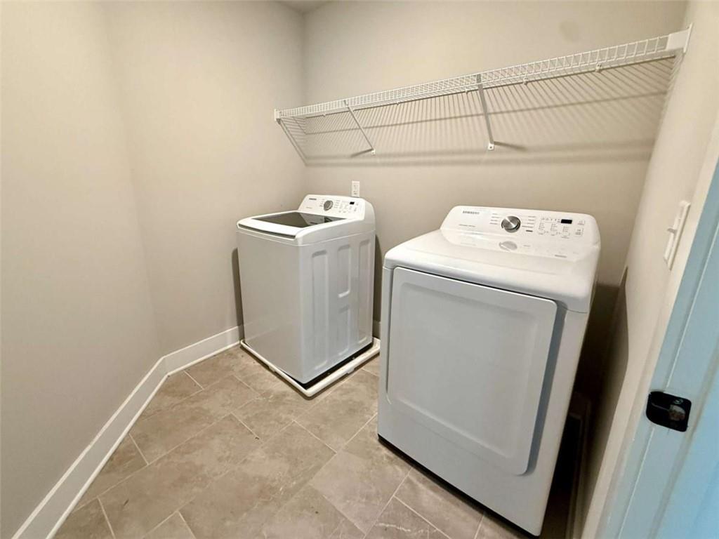 2362 Browns Mill Road Southeast Atlanta, GA 30315 - Photo 37 of 41 a utility room with dryer and washer