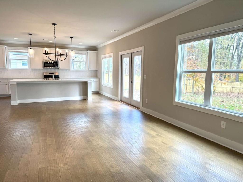 2362 Browns Mill Road Southeast Atlanta, GA 30315 - Photo 6 of 41 a view of an empty room with a window