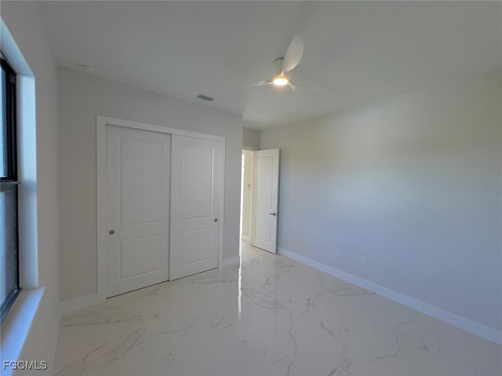 3672 68th Avenue Northeast Naples, FL 34120 - Photo 10 of 18 a view of an empty room