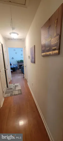 a view of hallway with furniture