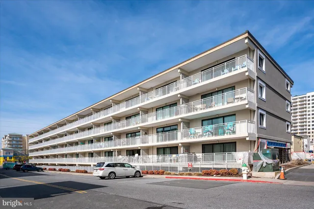 a front view of building with large windows