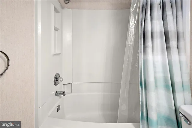 a bathroom with a bathtub