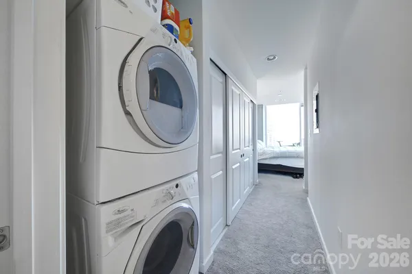 a view of a storage & utility room with washer and dryer