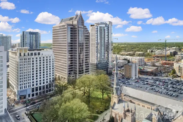 a view of a city with tall buildings