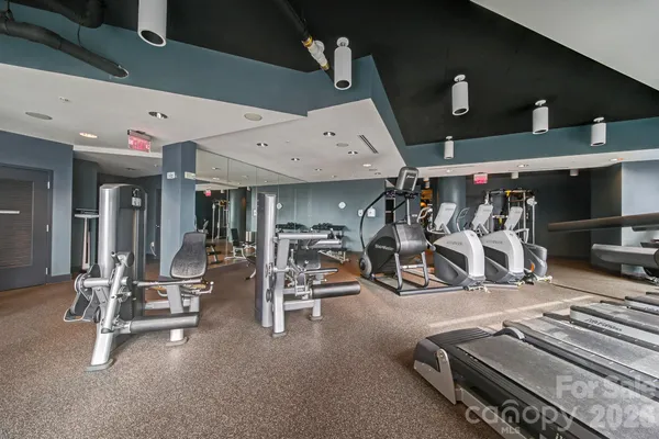 a view of a room with gym equipment