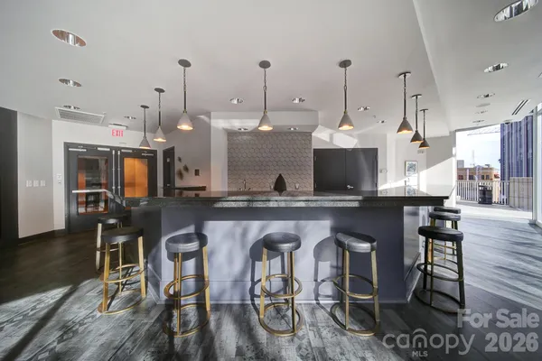 a view of kitchen and dining area with furniture