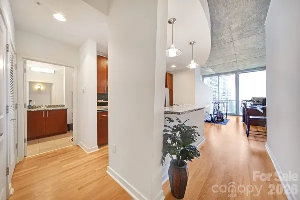 a view of a living room and hardwood floor