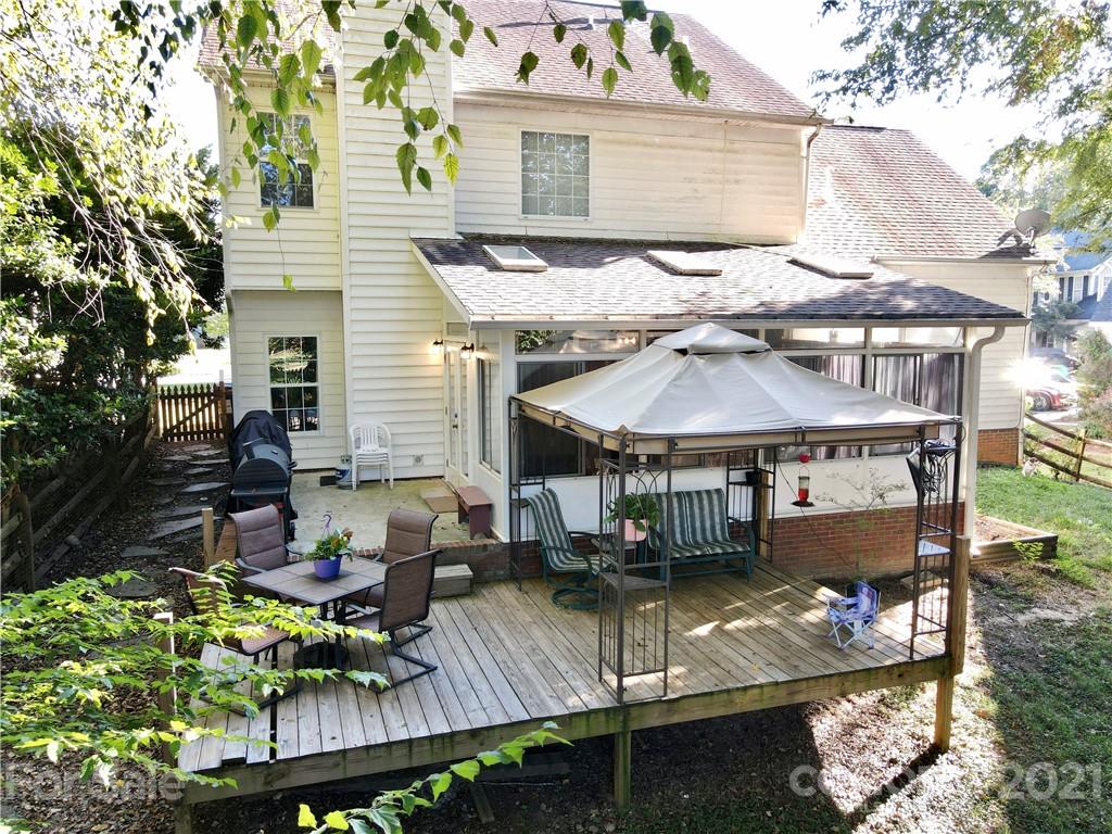 6607 Reedy Creek Road Charlotte, NC 28215 - Photo 27 of 27 a view of a house with pool and chairs