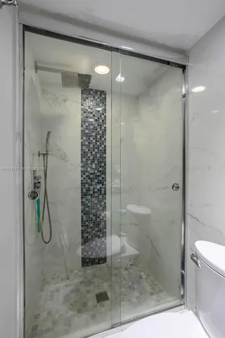 a bathroom with a sink a mirror and vanity