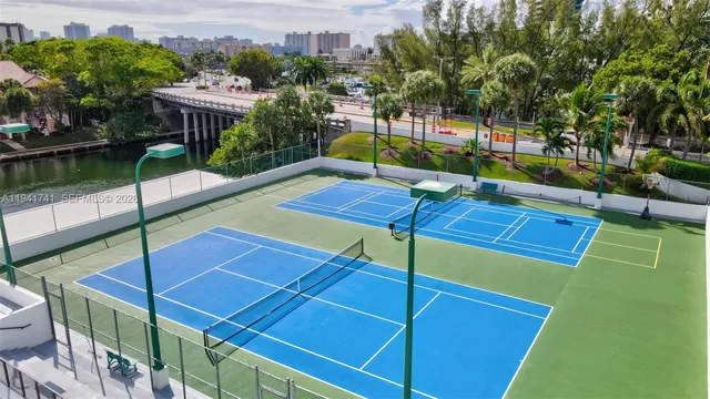a view of swimming pool with outdoor seating
