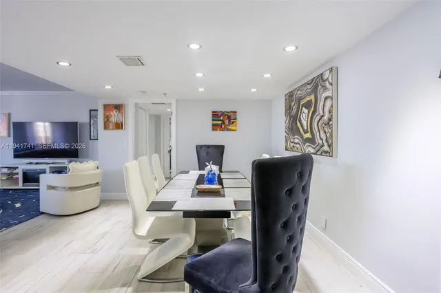 a view of a dining room with furniture