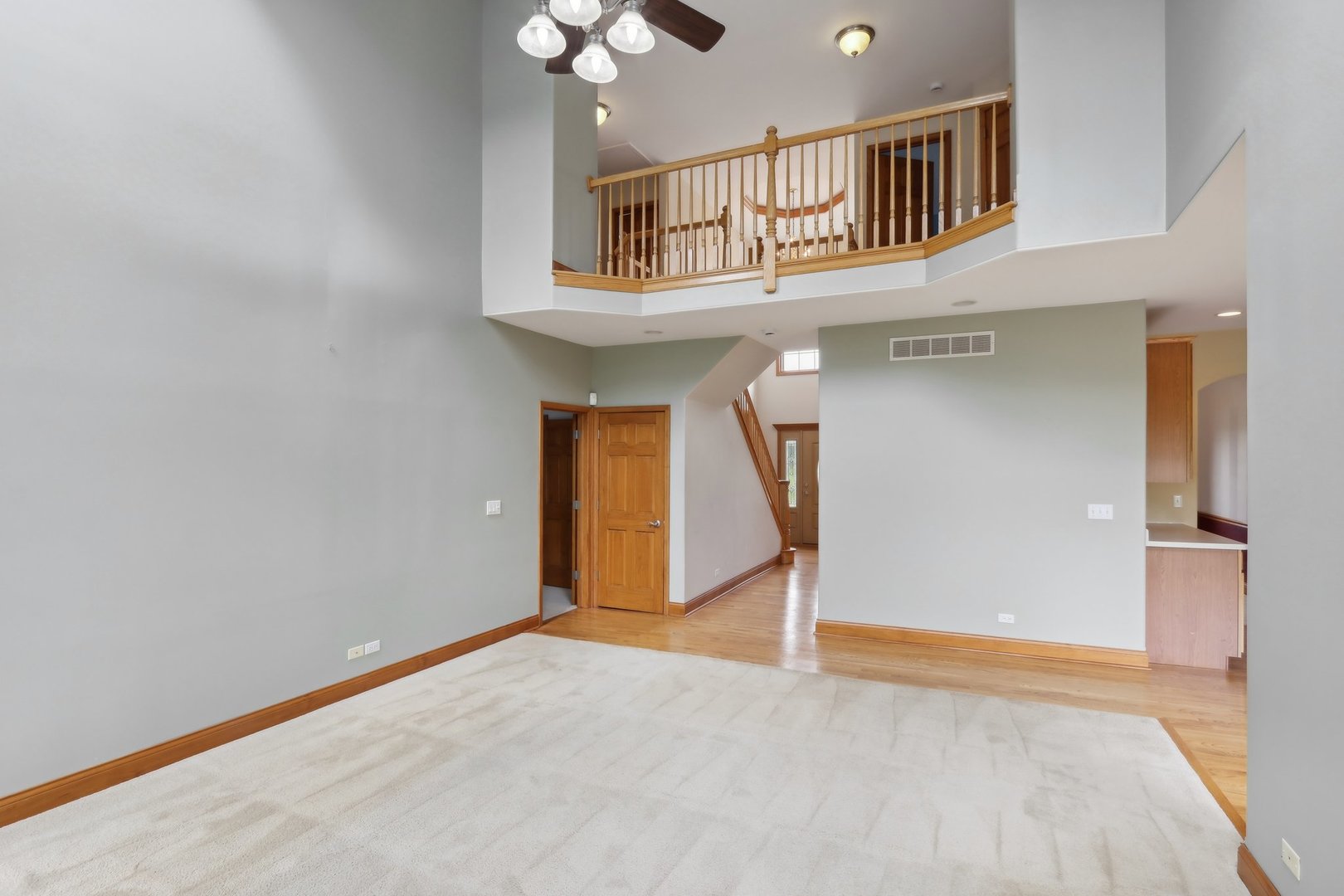 548 Asbury Drive Aurora, IL 60502 - Photo 18 of 48 a view of a livingroom with an empty space