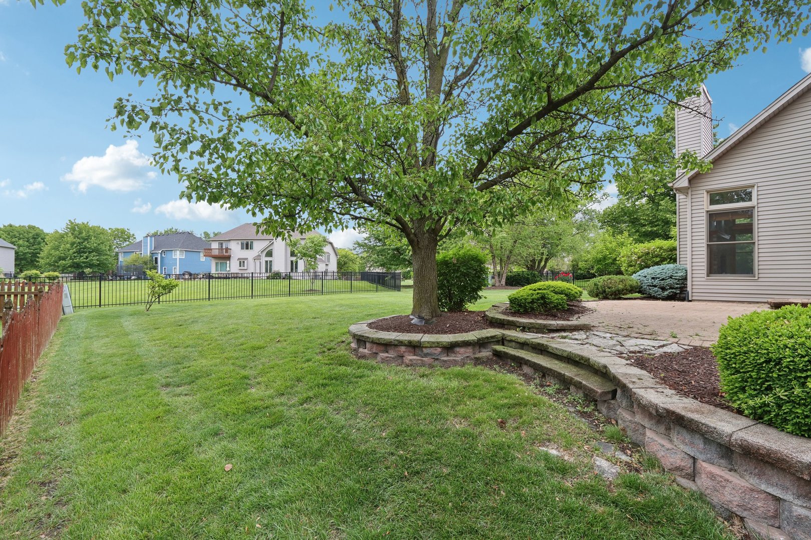 548 Asbury Drive Aurora, IL 60502 - Photo 42 of 48 a view of a garden with trees