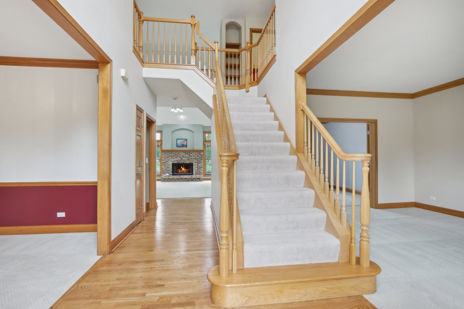 548 Asbury Drive Aurora, IL 60502 - Photo 5 of 48 a view of entryway and hall with wooden floor