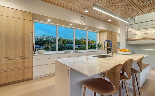 a view of an chairs and table in the patio