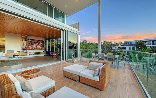 a view of a living room and entry way